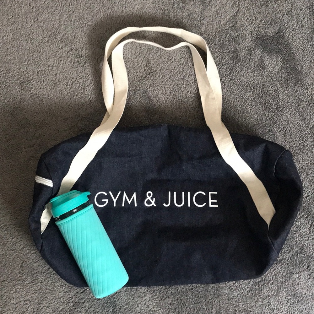 Duffle bag and glass water bottle